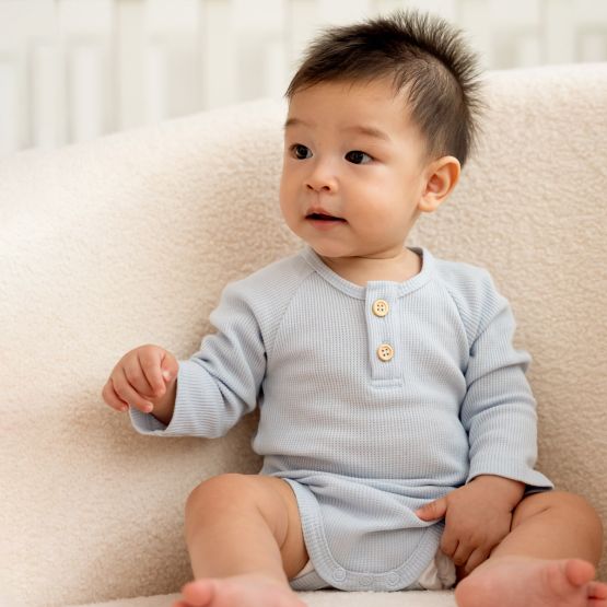 Baby Long Sleeve Romper in Baby Blue Waffle Jersey